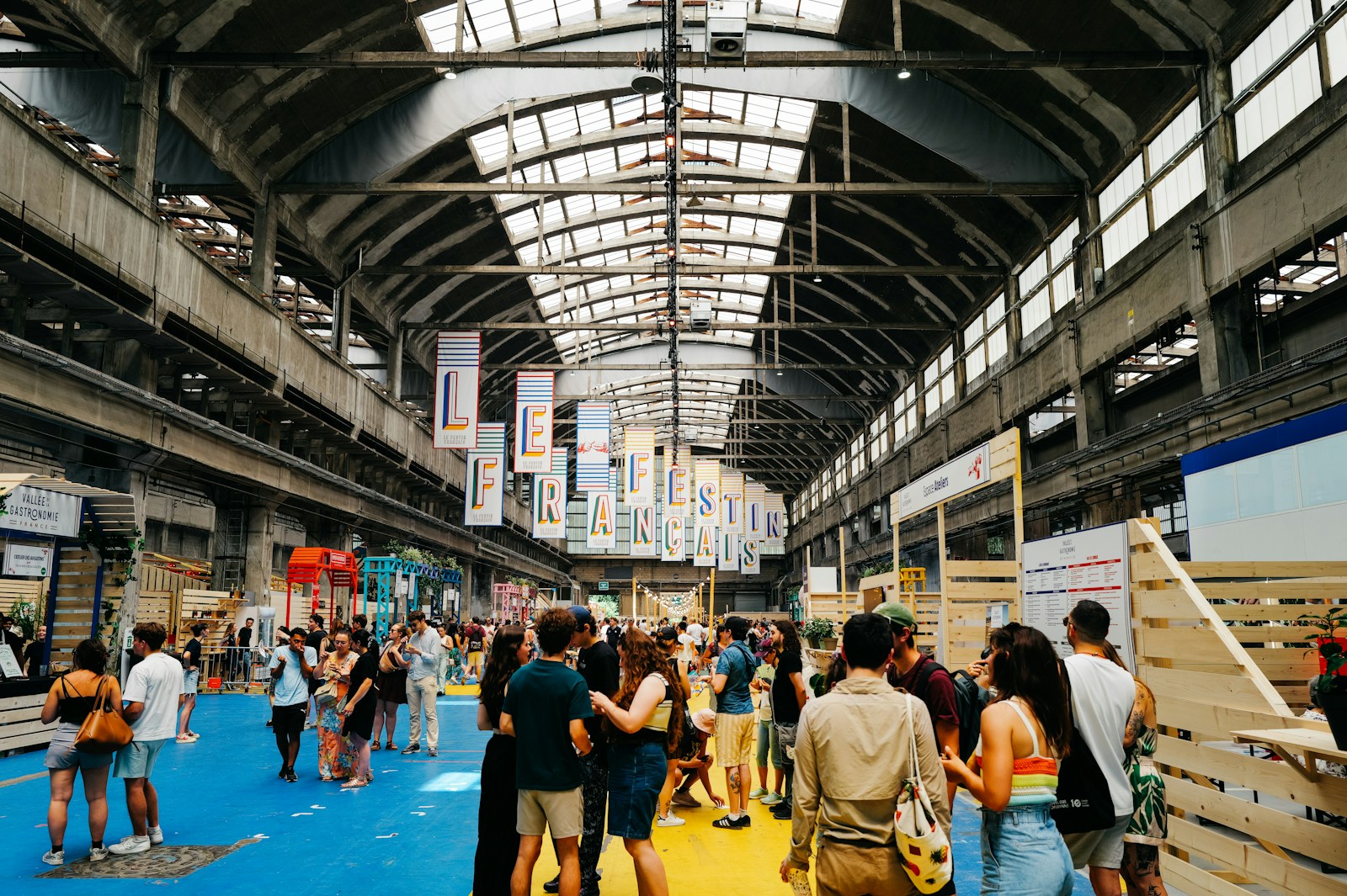 Large event is taking place inside a massive hall.